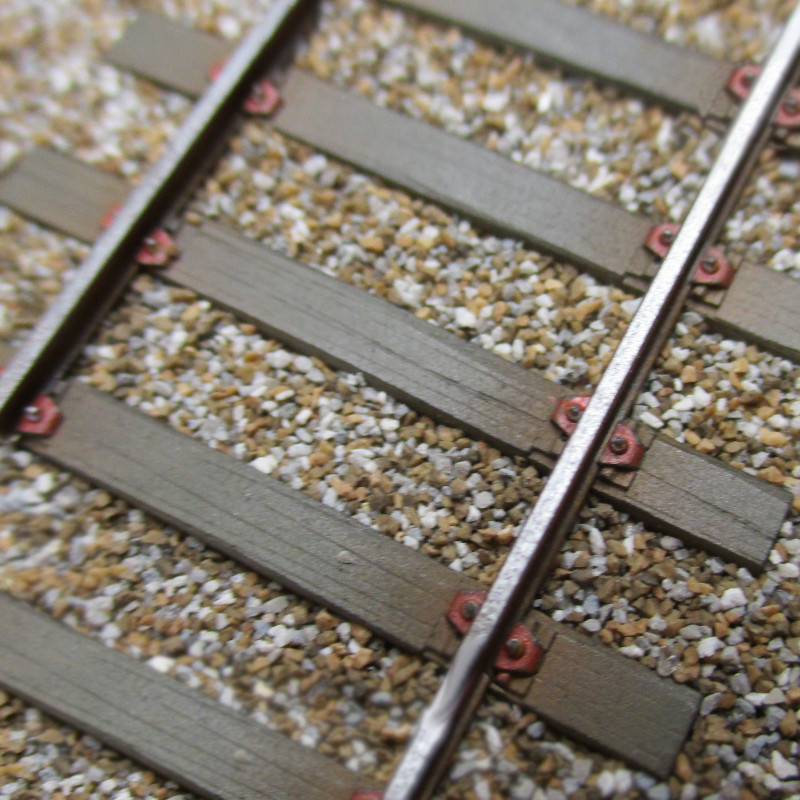 SNCF C60 - 18m_27 traverses - Pose élastique sur selles U77 3 trous avec griffons Nabla